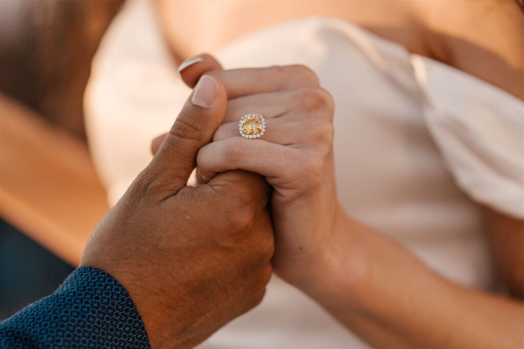 beautiful yellow diamond proposal ring in santorini close up detail by phosart