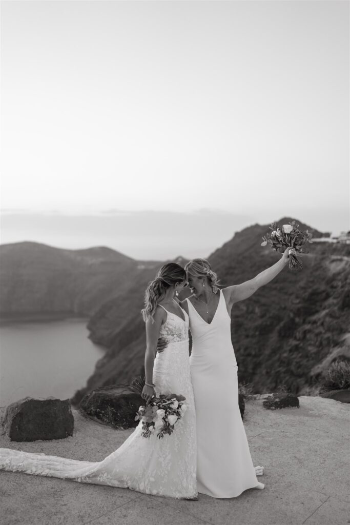 Same sex wedding in santorini gay couple black and white