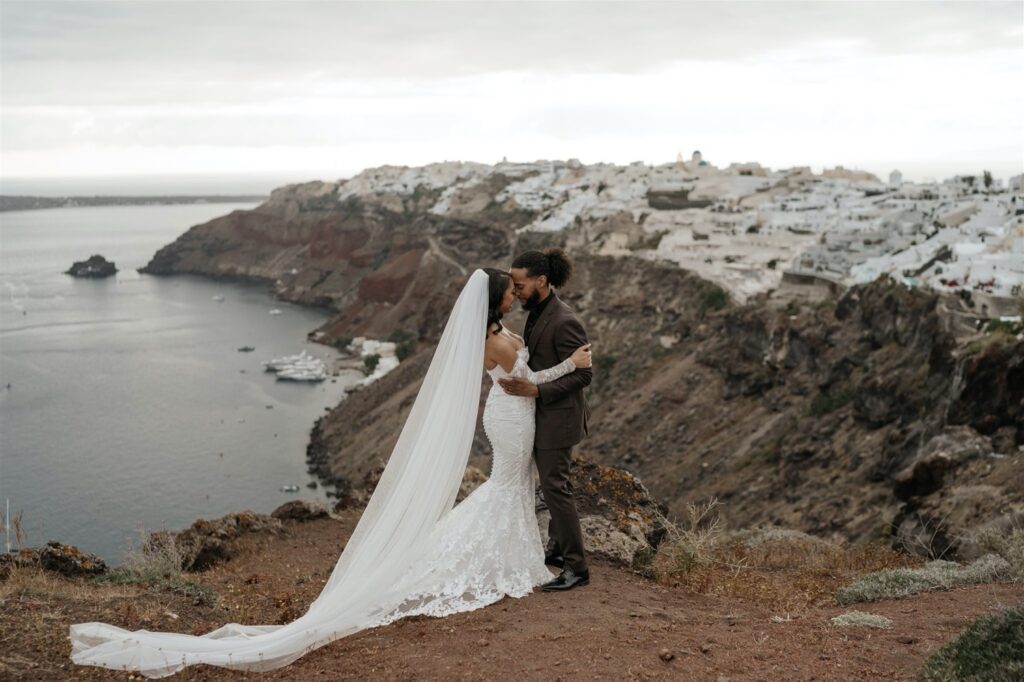 Caldera View Photoshoot Prewedding Moody Weather Destination Elopement Island Greece.jpg