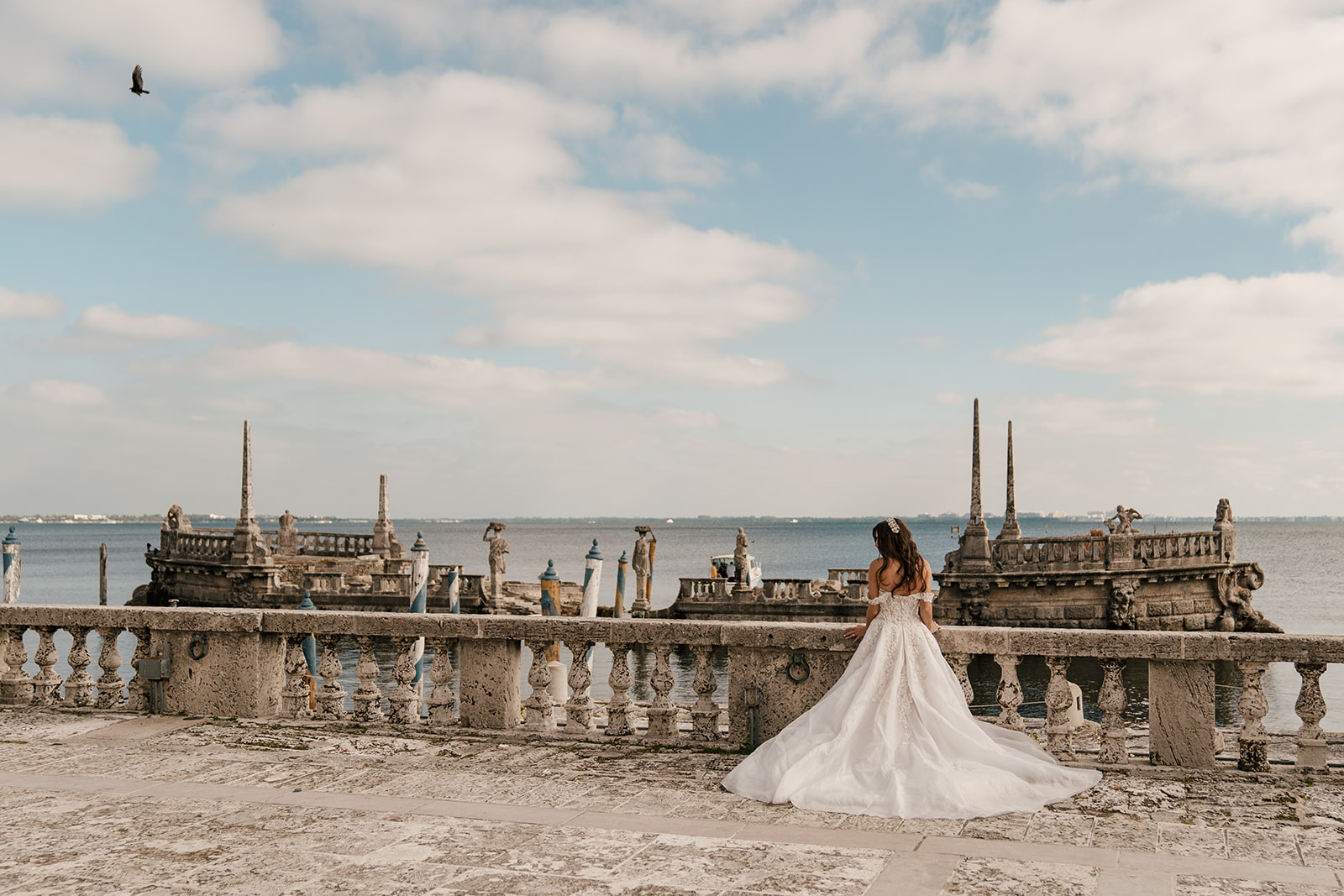 Bride in miami at vizcaya museum by the water