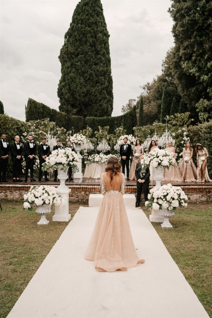 Bridemaid walking luxury gay wedding in italy by Phosart