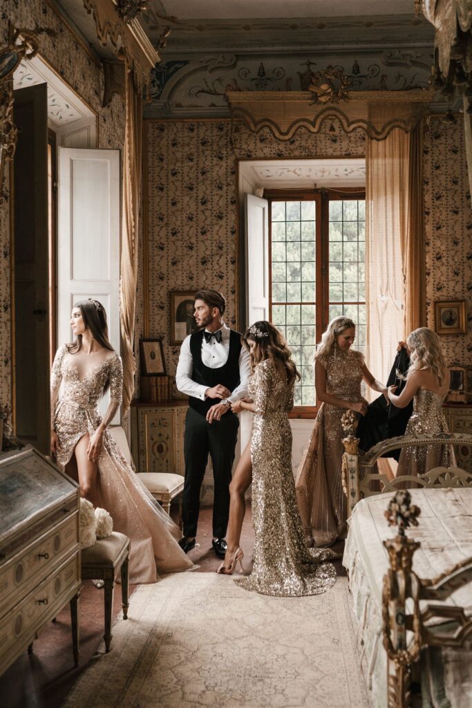 Groom preparations with bridemaids in Tusacny villa di geggiano