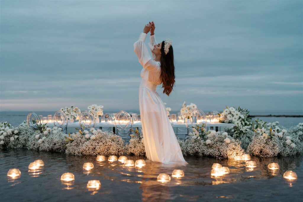 Bride In The Water with candels wedding photographer and cinematographer