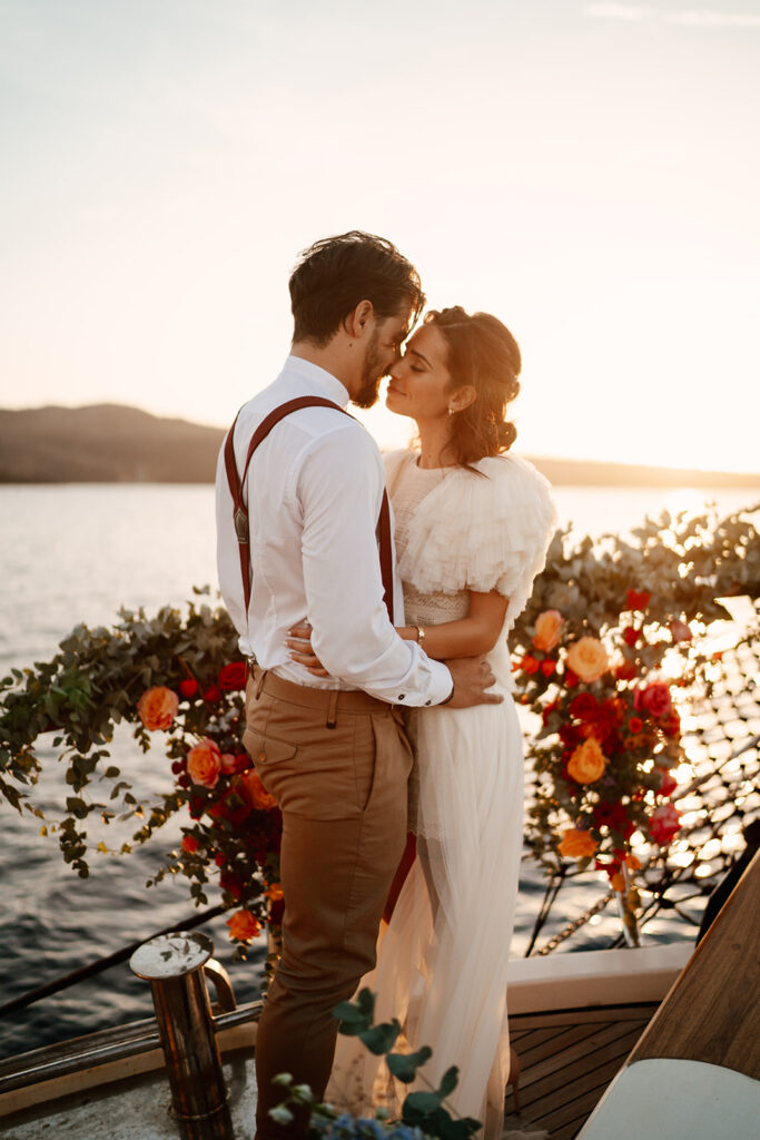 candid moment after the ceremony on boar of a boat in santorini