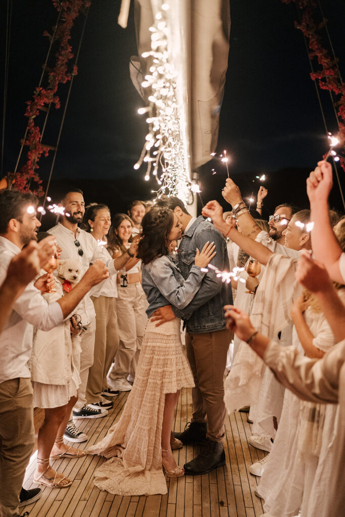 all white Wedding On yacht in santorini