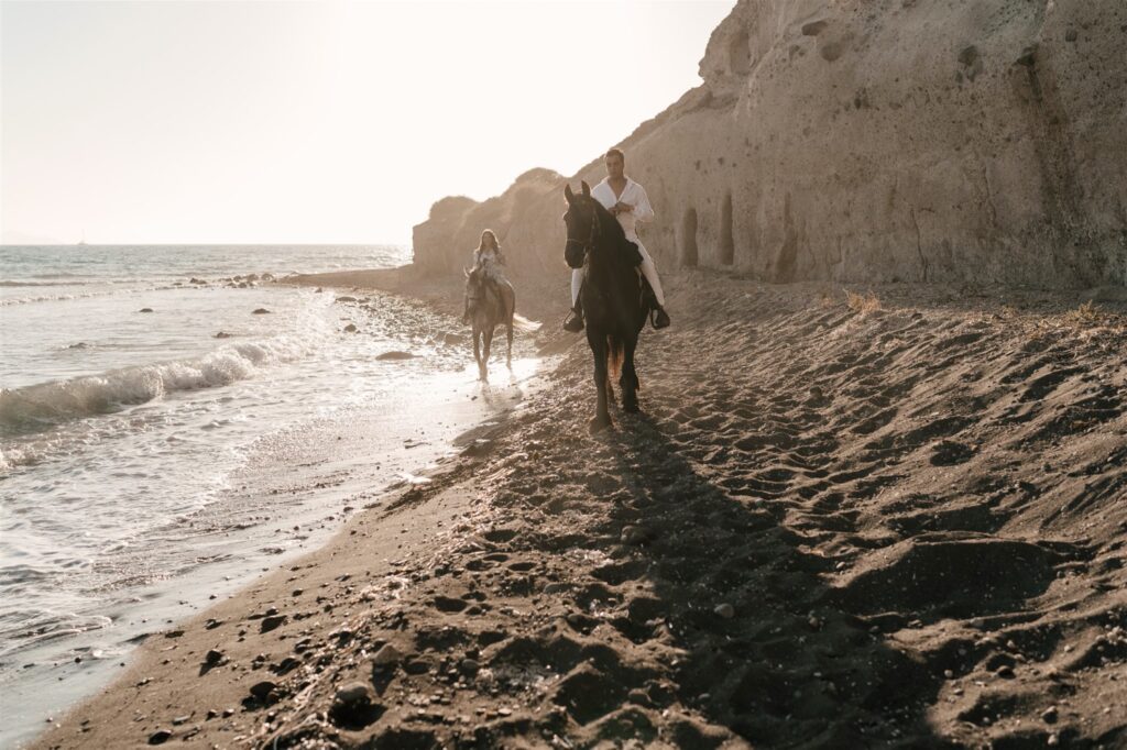 Couple Riding At Sunset By The Sea