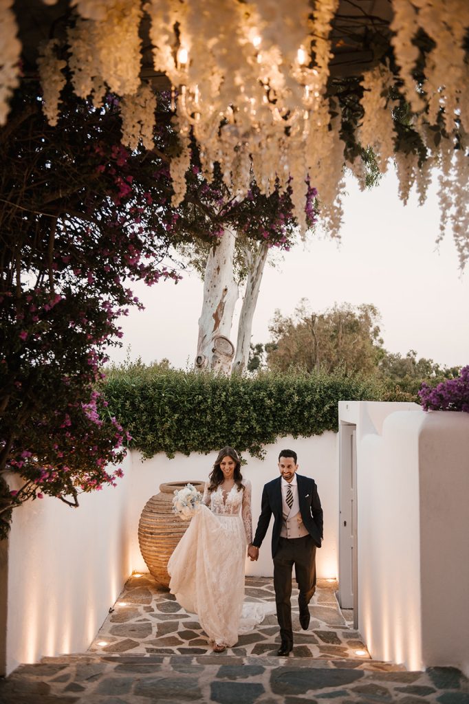 couple entering the island residence at Athens riviera