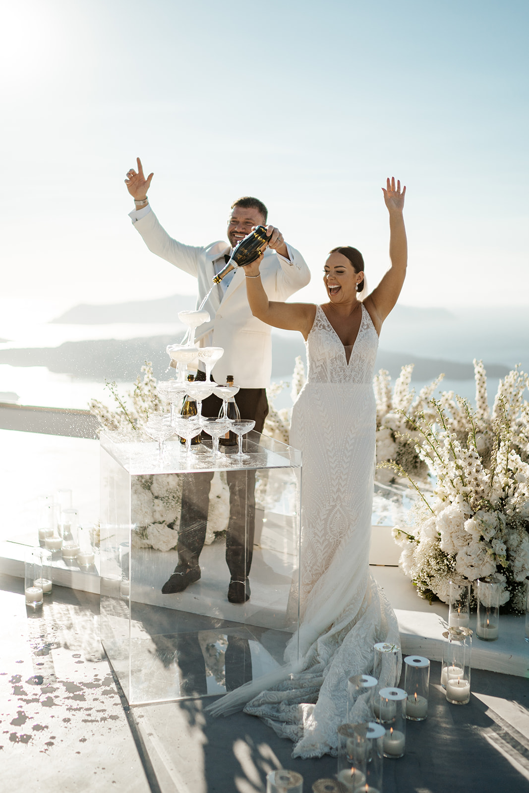 Pizza Cutting Unique Santorini Gem Elopement Champagne Tower