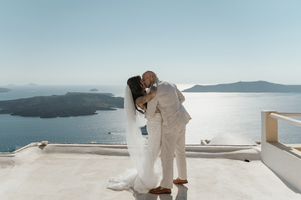 Cliffside Adventurous Elopement in Santorini caldera view