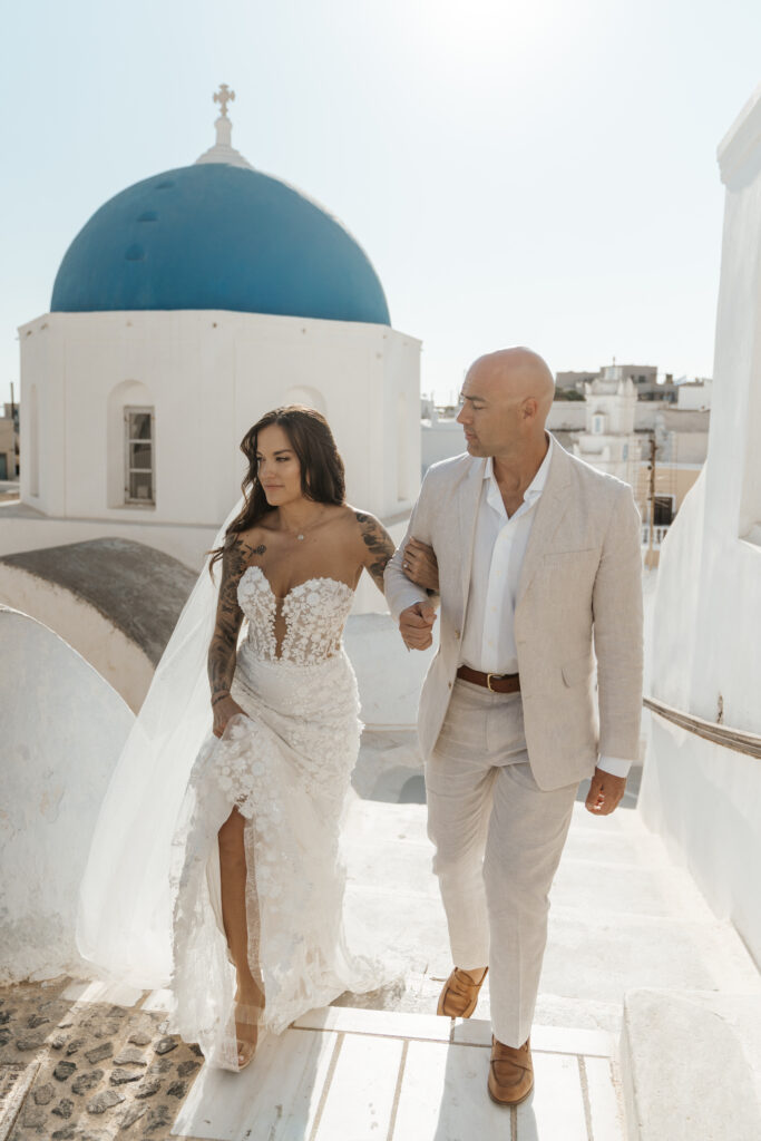 Cliffside Adventurous Elopement in Santorini blue domes
