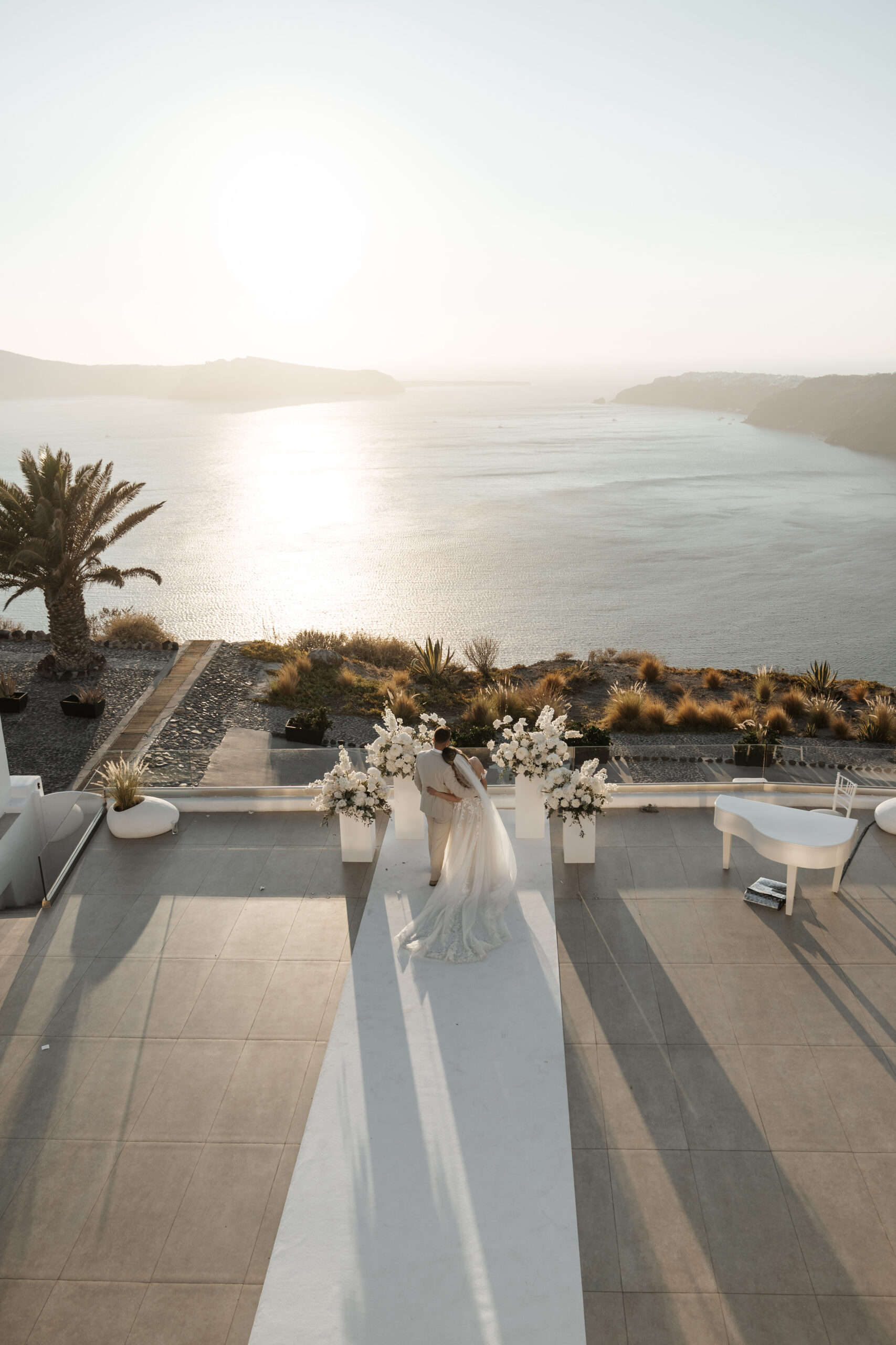 A Romantic Santorini Wedding at Le Ciel From Engagement to I Do featured