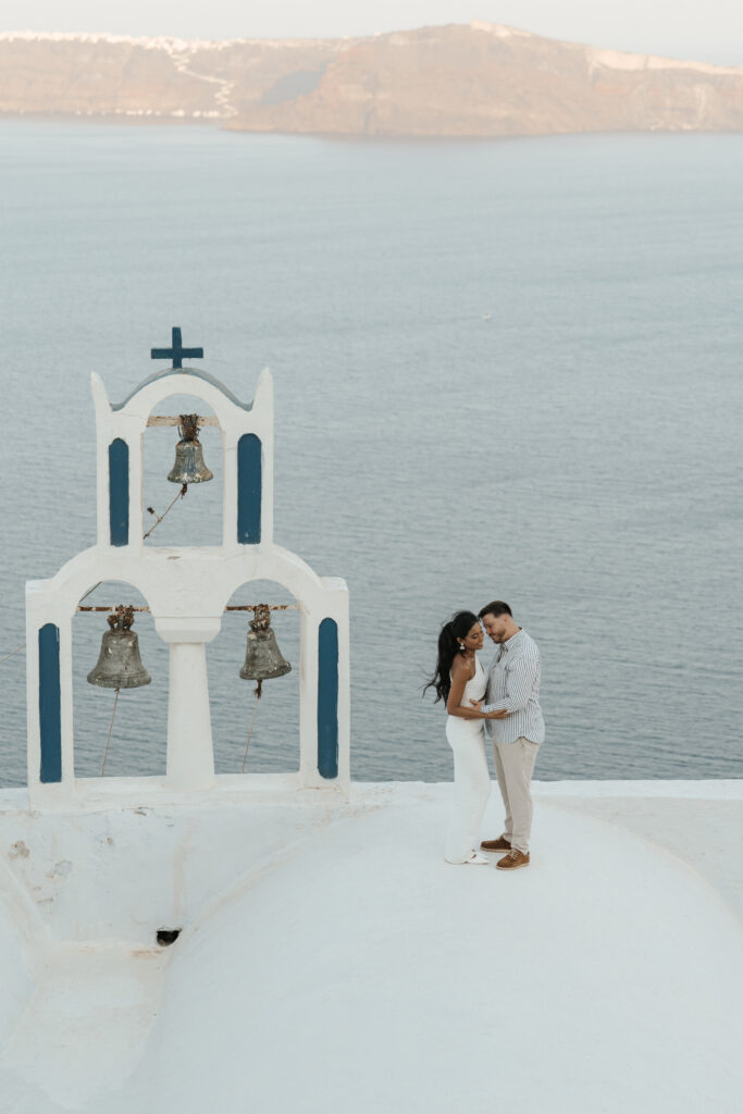 Skaros Rock Adventure Sunrise Couple Photoshoot in Santorini - featured